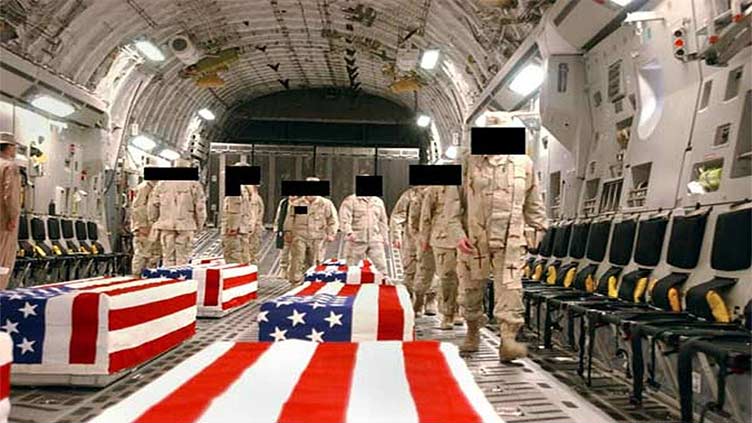 Image of caskets inside plane was released by Pentagon in 2005